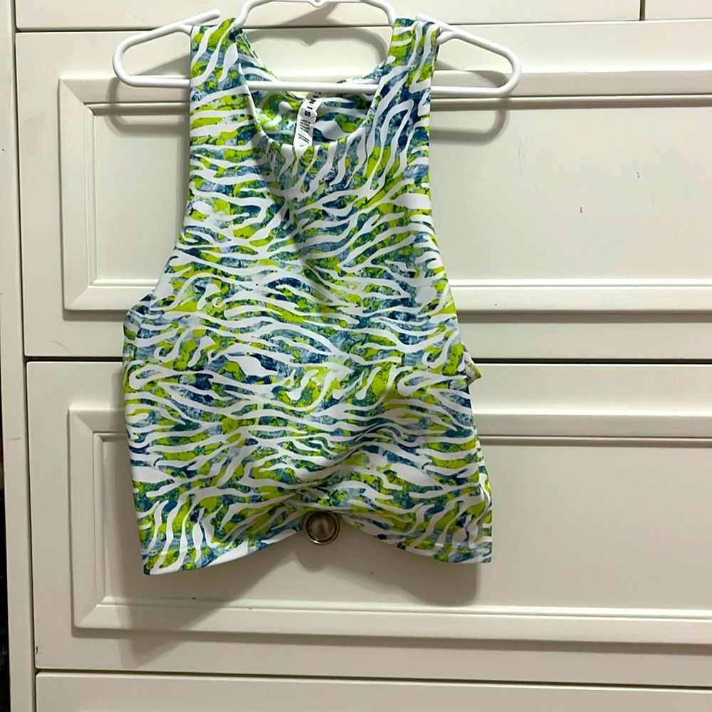 Green and white tank